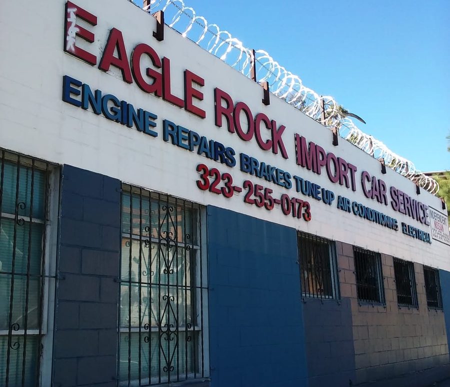 The hand painted wall on Colorado Blvd: Eagle Rock Import Car Service in big red letters, the services below it, and the phone number 323-255-0173
